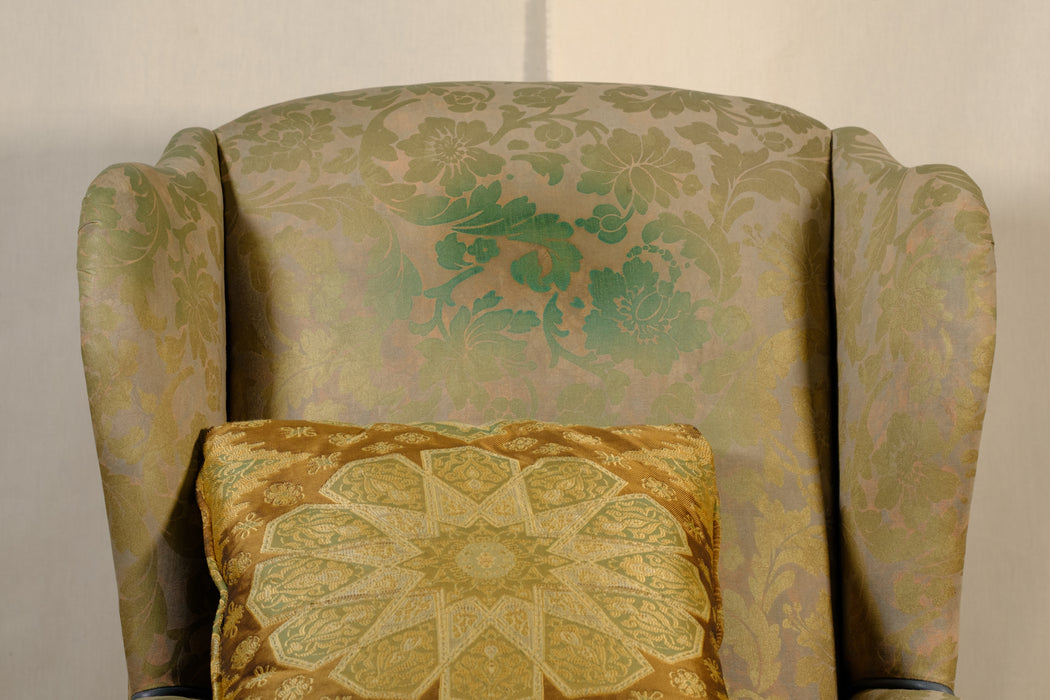 Antique Upholstered Wingback Chair