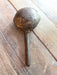 Antique iron casting spoon.